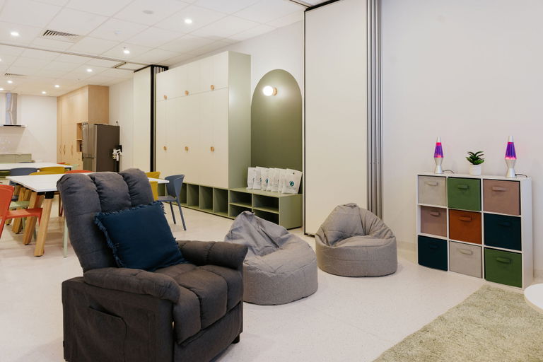 Sensory and relaxation lounge with a recliner and bean bags at the Morayfield Hub